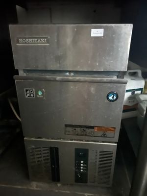 a stack of metal appliances sitting on top of each other