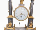 a clock that is sitting on top of a table