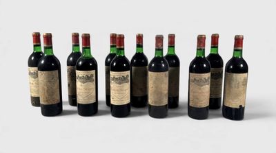 six bottles of wine are lined up on a white surface