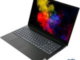 a close up of a laptop on a white surface with a colorful background