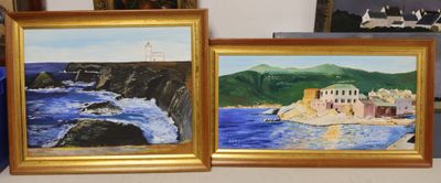 painting of a couple of paintings on a shelf next to each other