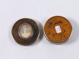 pair of antique bronze and enamel snuffs with a portrait of a woman and a man