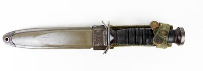 a knife that is laying on top of a table