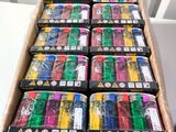 a box of assorted cigarettes sitting on a table