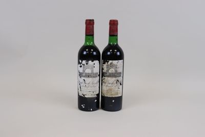 two bottles of wine sitting next to each other on a white surface