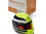 the helmet is yellow and black with a red dot on the vise