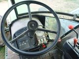 a close up of the steering wheel of a tractor