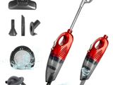 gros plan d'un aspirateur rouge et noir sur fond blanc