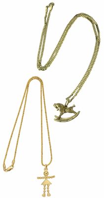 two gold necklaces and a bird on a chain on a white background