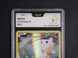 an image of a pokemon card with a rainbow in the background