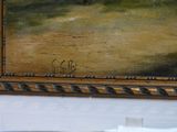 a picture of a painting hanging on a wall