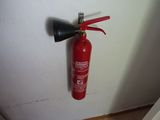 a fire extinguisor hanging on the wall