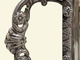 a close up of a metal door handle on a door