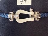 a blue rope with a silver clasp on it