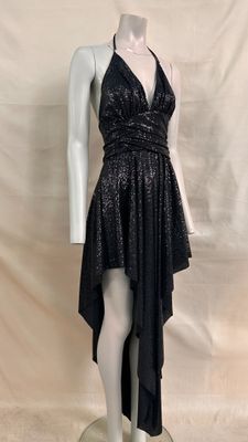 the mannequin is wearing a black dress on a white mannequin