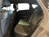 the back seat of a car with a seat belt in it