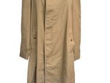 a women ' s trench coat on a mannequin mannequin
