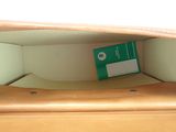 a box that is sitting on top of a dresser