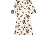 une image représentant une robe blanche ornée d'un motif floral