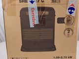 packaging for a black - injection heater in a box on a white surface