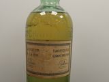 an image of a bottle of alcohol sitting on a table