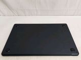 an image of a black computer mouse pad on a white surface