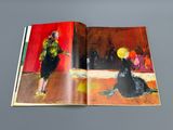 an open book with a picture of a woman and a dog