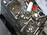 a box full of tools sitting on the floor