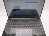 a laptop that has a keyboard on top of it