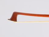 the bow of a violin is made of wood and has a curved handle