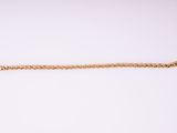 an image of a gold chain on a white background
