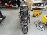 a machine that is sitting on the floor in a room