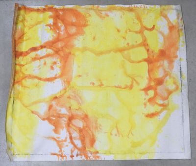 a picture of a yellow and orange painting on a piece of paper