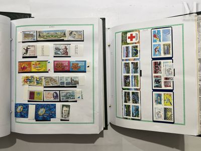 two open books with stamps on them on display