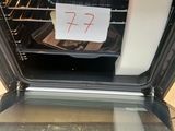 a sign on the door of an oven that says 72
