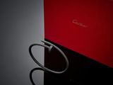 the red box has a black ring on it and is next to the black box
