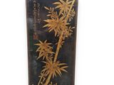 an image of a picture of a bamboo tree on a wall