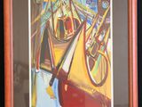 tableau encadré et monté sur passe-partout représentant un voilier et un vélo