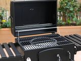 an image of a bbq grill on a patio table
