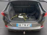 the trunk of a car with a bunch of wires in it