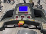 a close up view of a tread machine in a gym