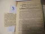 un vieux livre recouvert d'une feuille de papier