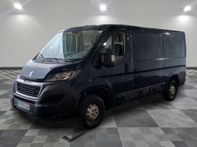 a picture of a black van parked on a checkered floor