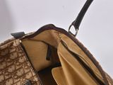 the inside of a purse with a zipper on the inside
