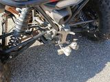 a close up of the front of a four wheeler atv
