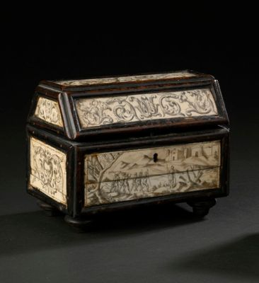 a wooden box with writing on it sitting on a table
