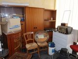 an image of a cluttered living room with a lot of clutter
