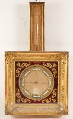 a clock that is hanging on the wall in the room