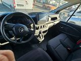 a car with a steering wheel and a dash board