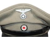 an image of a military hat with a badge on it